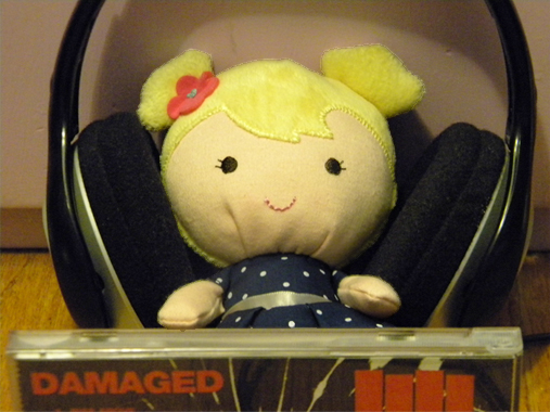 little doll listens to Black Flag's Damaged