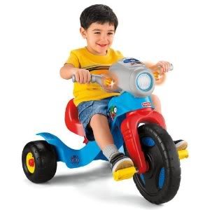 little boy on a trike